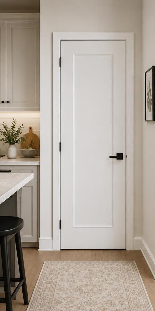 White shaker interior door beside a kitchen